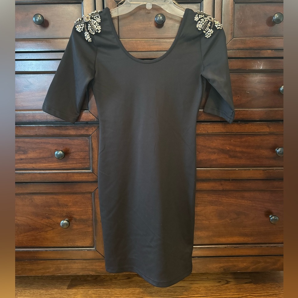 Never worn, no tags.